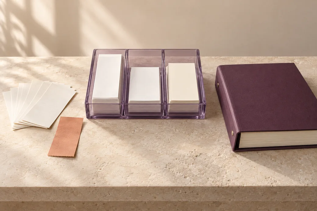 Income statements and a separate tax-paid receipt sorted into compartments before an annual return.